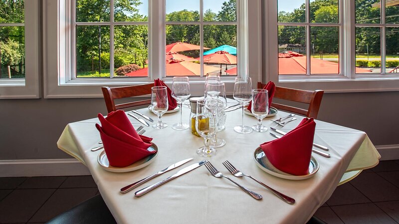 Dining room table set for four