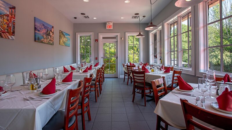 Dining room with many set tables